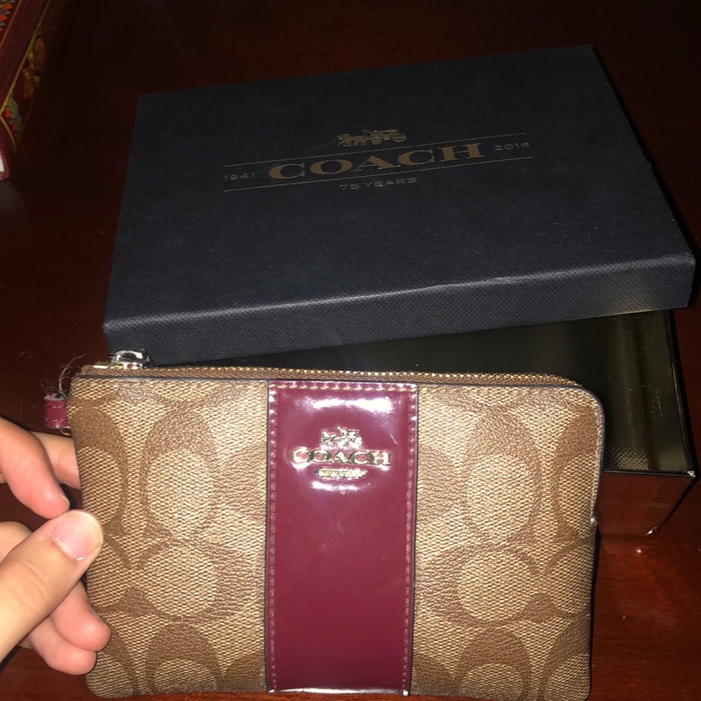 Brand new Coach Wristlet with box